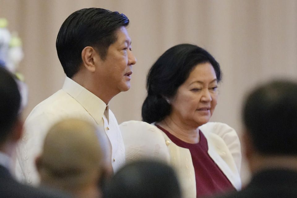 Philippine President Ferdinand Marcos Jr. and his wife Madame Louise Araneta Marcos arrive for the opening ceremony of the 40th and 41st ASEAN Summits (Association of Southeast Asian Nations) in Phnom Penh, Cambodia, Friday, Nov. 11, 2022. The ASEAN summit kicks off a series of three top-level meetings in Asia, with the Group of 20 summit in Bali to follow and then the Asia Pacific Economic Cooperation forum in Bangkok. (AP Photo/Vincent Thian)