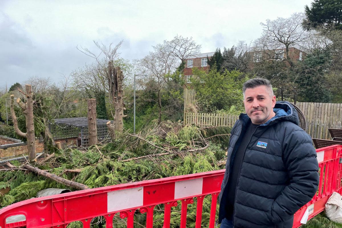 WORRY: Adam Giagnotti, owner of the Olive Branch and  Impasto, in his garden after the Reservoir Lane wall collapse in February <i>(Image: James Connell/Newsquest)</i>