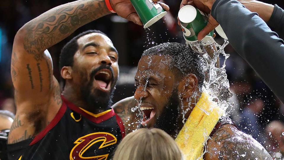 LeBron’s teammates must have seen it all before but they are still pumped. Pic: Getty