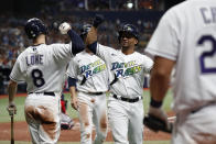 Tampa Bay Rays' Francisco Mejia celebrates his two-run home run with Brandon Lowe (8) during the fourth inning of a baseball game against the Boston Red Sox on Saturday, July 31, 2021, in St. Petersburg, Fla. (AP Photo/Scott Audette)