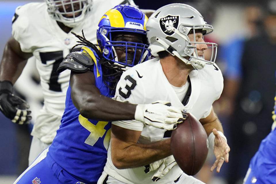 Las Vegas Raiders quarterback Nathan Peterman (3) is sacked by Los Angeles Rams linebacker Chris Garrett during the first half of a preseason NFL football game Saturday, Aug. 21, 2021, in Inglewood, Calif. (AP Photo/Jae C. Hong)