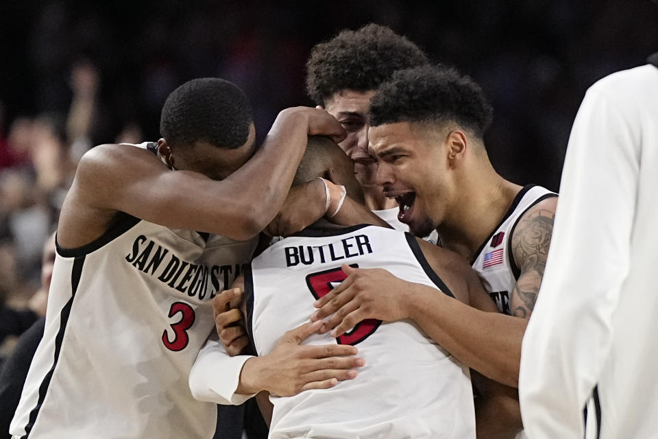 San Diego State reacts after their win against Florida Atlantic in a Final Four college basketball game in the NCAA Tournament on Saturday, April 1, 2023, in Houston. (AP Photo/Brynn Anderson)