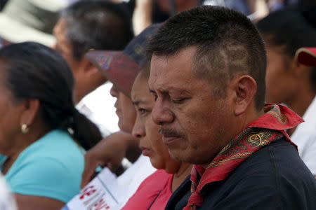 Clemente Rodriguez, father of Christian Rodriguez, one of the missing students of the Ayotzinapa teacher's training college, has a "43" design shaved on his head, during the delivery of the final report on the disappearance of the 43 students at Ayotzinapa teacher training college by members of the Inter-American Commission on Human Rights (IACHR), in Tixtla, Guerrero state, Mexico, April 27, 2016. REUTERS/Ginnette Riquelme