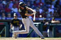 Pittsburgh Pirates' Cole Tucker hits a single off Philadelphia Phillies' Cristopher Sanchez during the fourth inning of a baseball game, Sunday, Sept. 26, 2021, in Philadelphia. (AP Photo/Derik Hamilton)