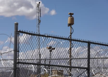 Razor wire and security cameras at the entrance to Area 51 as an influx of tourists responding to a call to 'storm' Area 51, a secretive U.S. military base believed by UFO enthusiasts to hold government secrets about extra-terrestrials, is expected