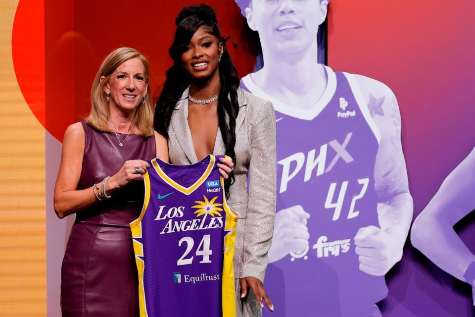 PHOTO: Tennessee's Rickea Jackson, right, poses for a photo with WNBA commissioner Cathy Engelbert after being selected fourth overall by the Los Angeles Sparks during the first round of the WNBA basketball draft, April 15, 2024, in New York.  (Adam Hunger/AP)