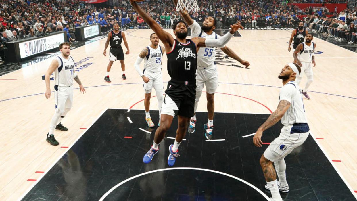 <div>A Clippers forward Paul George (13) slam dunks at Crypto.Com Arena. (Robert Gauthier/Los Angeles Times via Getty Images)</div> <strong>(Getty Images)</strong>