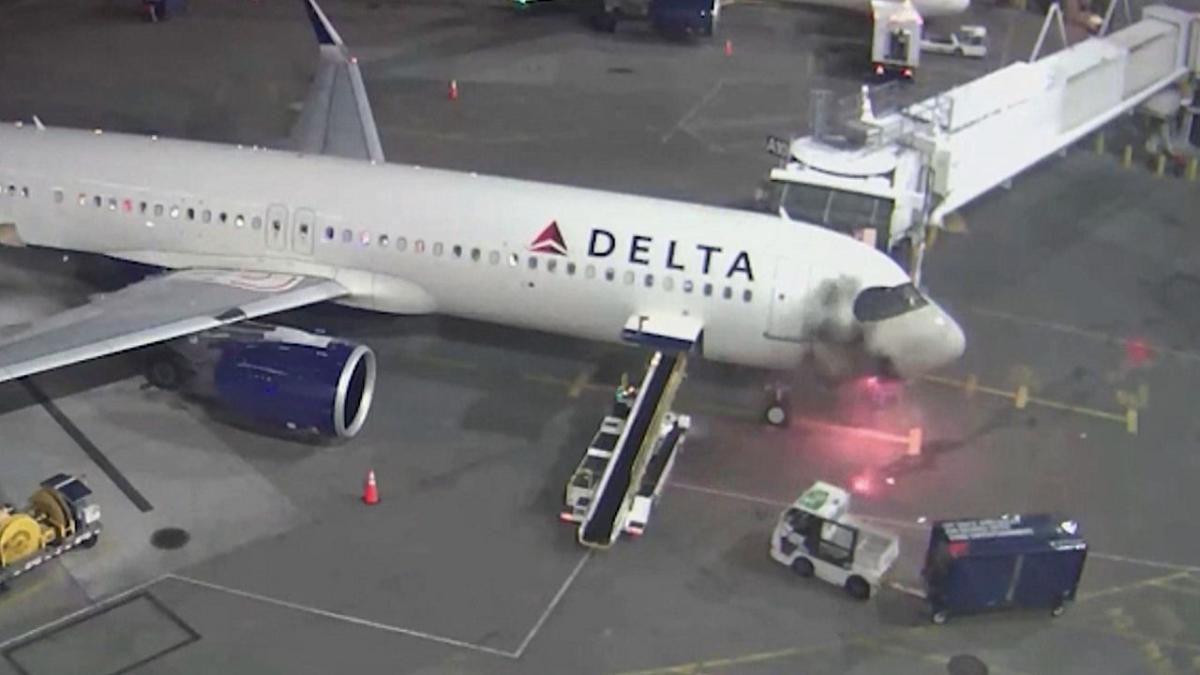 Delta plane catches fire seattle