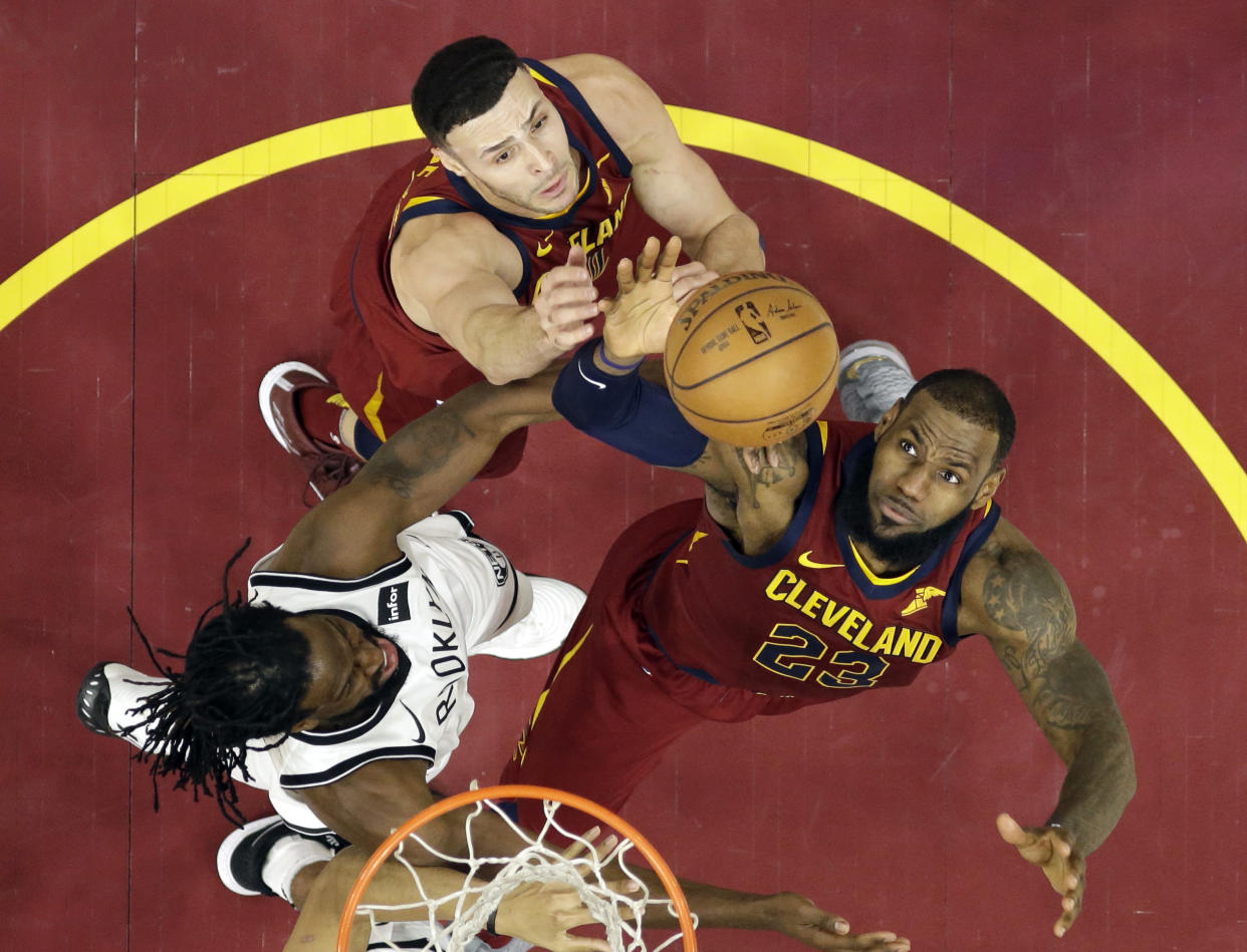 LeBron James goes up and grabs the rebound. He’s gotten a few of those over his 15-year career. (AP)