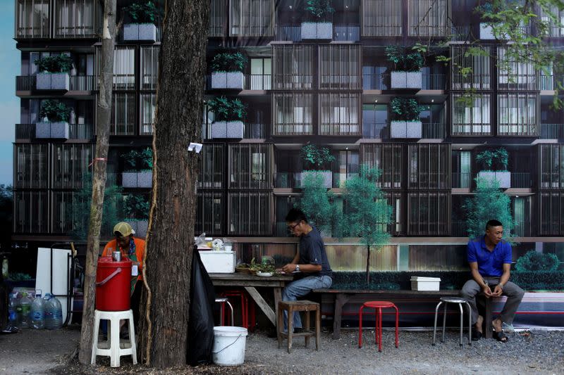 The Wider Image: In old Bangkok, a goddess resists a wave of gentrification