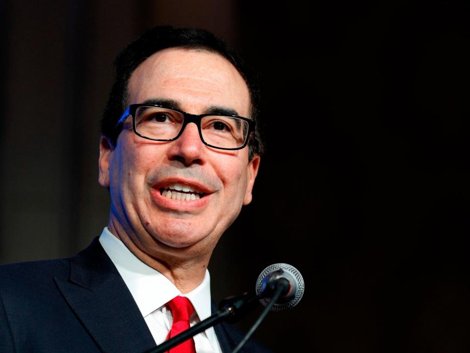 Mr Mnuchin decided not to attend after meeting with the president and US secretary of State: AFP/Getty Images