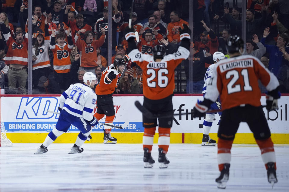 Philadelphia Flyers' Tyson Foerster, second from left, celebrates after scoring a goal during the third period of an NHL hockey game against the Tampa Bay Lightning, Tuesday, Feb. 27, 2024, in Philadelphia. (AP Photo/Matt Slocum)