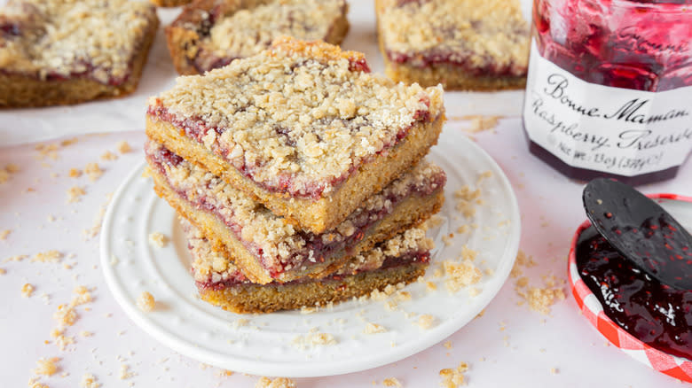 raspberry bars on a plate