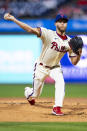 Philadelphia Phillies starting pitcher Zack Wheeler delivers to a Cincinnati Reds batter during the first inning of a baseball game Wednesday, April 3, 2024, in Philadelphia. (AP Photo/Chris Szagola)