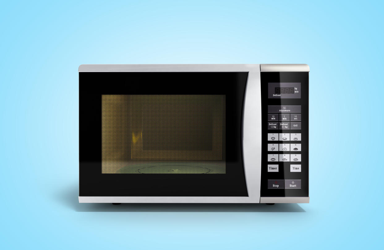 Is a microwave a kitchen essential? Many foodies are making the case that it's time to let the appliance gp. (Photo: Getty Creative)