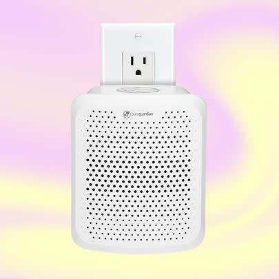 A pluggable Germ Guardian air purifier with nightlight
