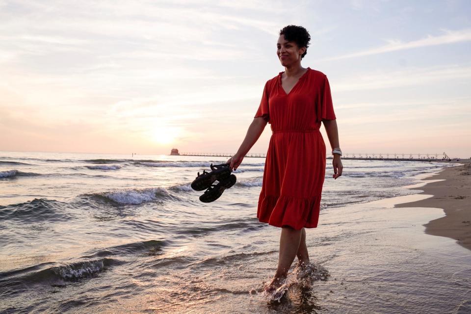 Racheal Rickabaugh, 36, of Grand Haven, at Grand Haven State Park on Thursday, Aug. 10, 2023.