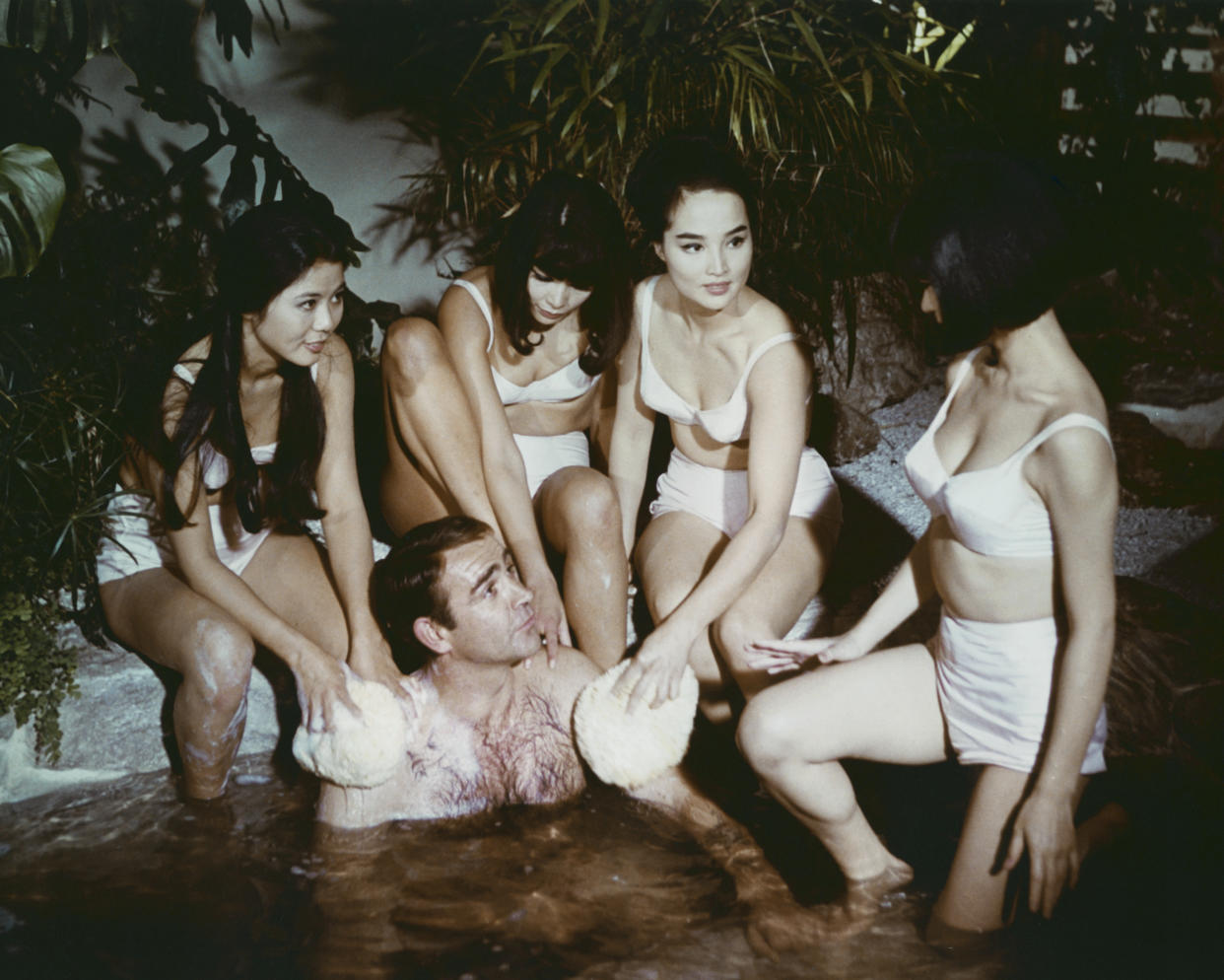 Scottish actor Sean Connery as James Bond enjoys a Japanese onsen or bath in the film 'You Only Live Twice', 1967. (Photo by Silver Screen Collection/Getty Images)
