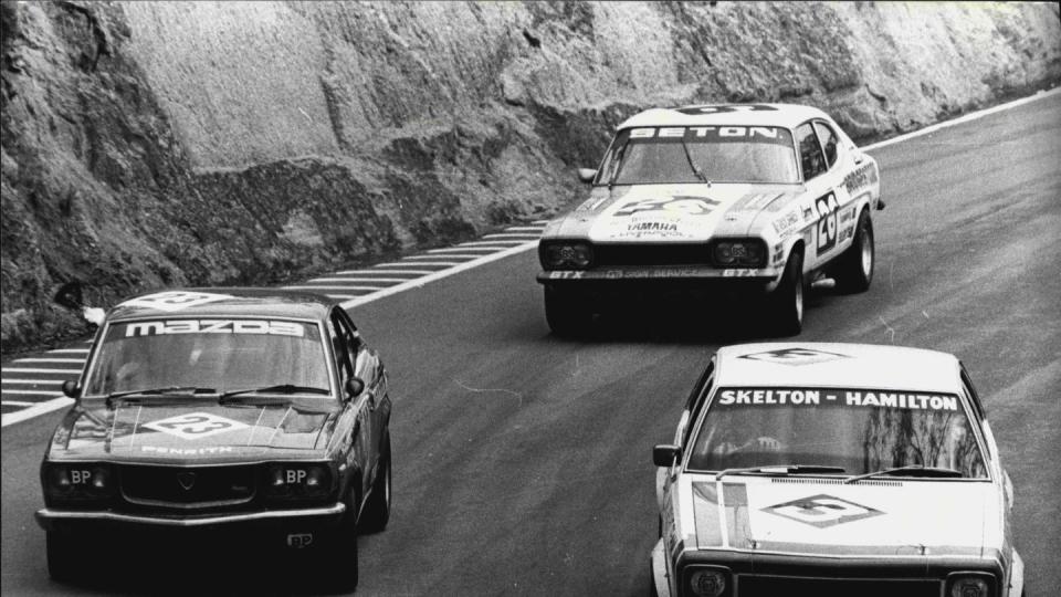 hardie ferodo 1000 from bathurst mount panorama race coursecar 3 the bob skeltonalan hamilton torana slr 5000 heads the don hollandlynn brown mazda rx3 and the barry setondon smith ford capri no 26 down a tight bendforest elbow