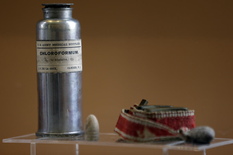 Shown are Civil War era "Chloroformum" and tourniquet at the Pry House Field Hospital Museum Friday, June 21, 2013, in Keedysville, MD. The house is located on the Antietam Battlefield, which served both as Union General George McClellan's and Union Army Maj. Dr. Jonathan Letterman's headquarters during the battle. As gunshots ravaged the bodies of tens of thousands of soldiers at the Battle of Gettysburg, military doctors responded with a method of treatment that is still the foundation of combat medicine today. (AP Photo/Matt Rourke)