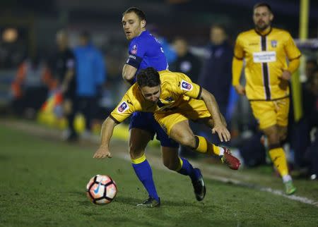 Britain Football Soccer - AFC Wimbledon v Sutton United - FA Cup Third Round Replay - The Cherry Red Records Stadium - 17/1/17 Sutton's Matt Tubbs in action with Wimbledon's Barry Fuller Mandatory Credit: Action Images / Peter Cziborra Livepic