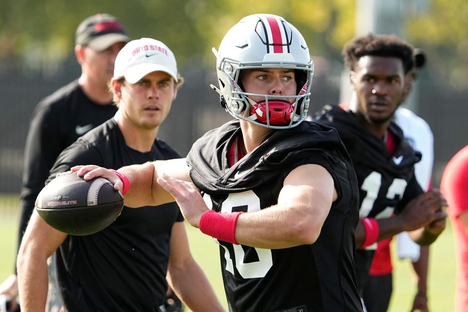 Aug 1, 2024; Columbus, OH, USA; Ohio State Buckeyes quarterback Will Howard (18) throws during football camp at the Woody Hayes Athletic Complex.