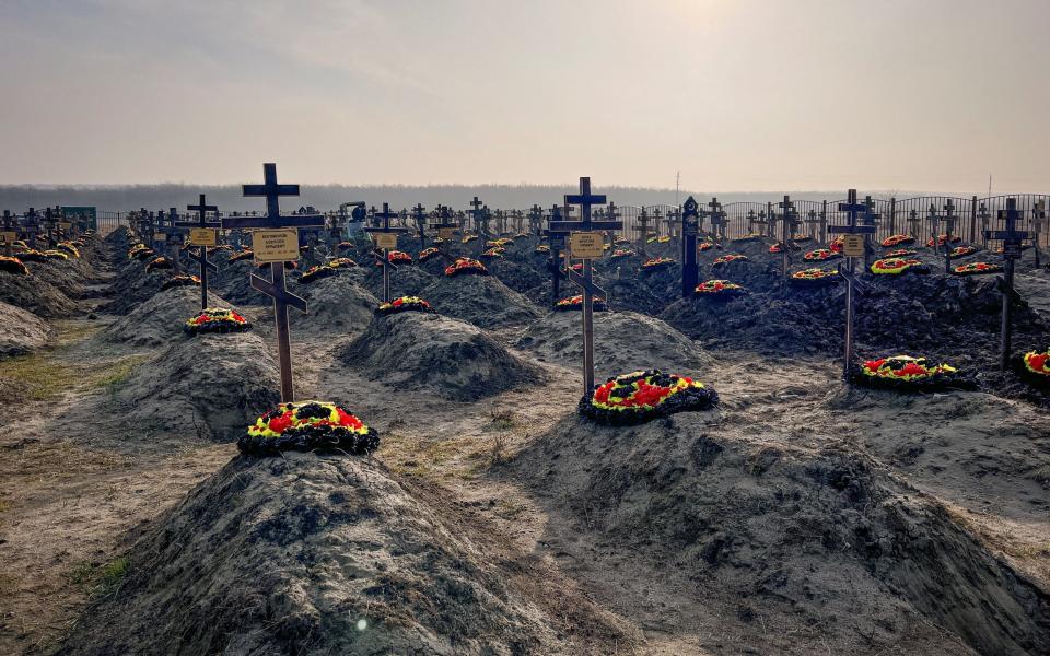 Graves of Russian Wagner mercenary group fighters are seen in a cemetery near the village of Bakinskaya - STRINGER/REUTERS