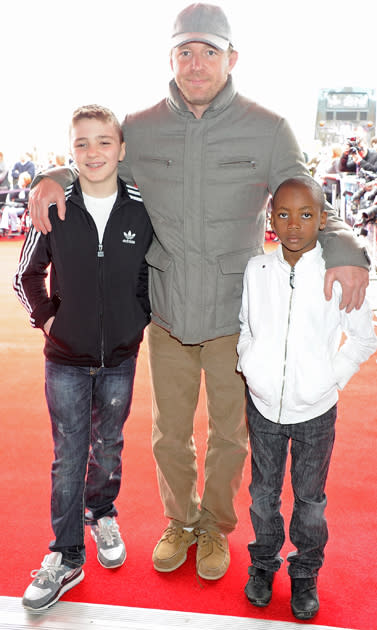 Harry Potter premiere: Guy Ritchie was in attendance with sons Rocco and David Banda, lets hope all three of them smiled once they got on set!