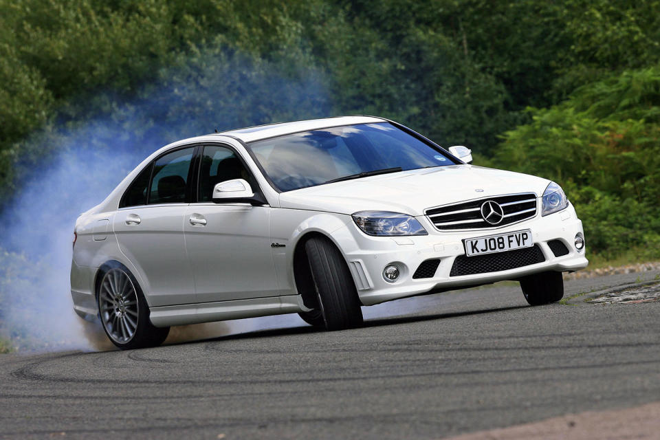 <p>AMG’s record with <strong>potent</strong> V8s is long and distinguished, but the 2008 C63 stands out as a highlight, shoehorning in a 451bhp 6.2-litre motor to an <strong>unsuspecting</strong> C-Class. That wasn’t the end of AMG’s ambitions for this model, either, as they then offered the Performance Pack with 480bhp and then the DR520 with <strong>513bhp</strong>.</p><p>All of this power would be pointless if the C63 wasn’t good to drive, but thankfully it scored a <strong>bullseye</strong> here. It’s nimble, agile and also capable of refined daily use, but the core of this car is always about that normally aspirated 6208cc V8 engine. Form the moment you turned the key, it let you know what the C63 was all about.</p>