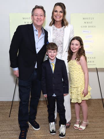 <p>Jamie McCarthy/Getty </p> Michael Feldman and Savannah Guthrie attend the "Mostly What God Does" book presentation on February 21, 2024 in New York City.