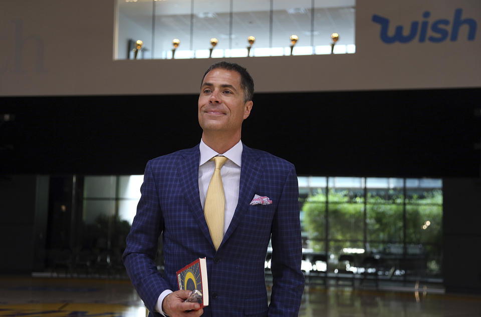 The Lakers promoted Rob Pelinka and reached a contract extension with the general manager on Friday. (AP/Reed Saxon)