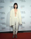 WORST: South Korean actress Doona Bae is just now being introduced to English-speaking audience through her new role in the upcoming film "Cloud Atlas." Too bad she chose this outfit to make her grand debut. The ensemble is at once too revealing (cover up that ugly bra, missy!) and too baggy (is she actually wearing a cape?).