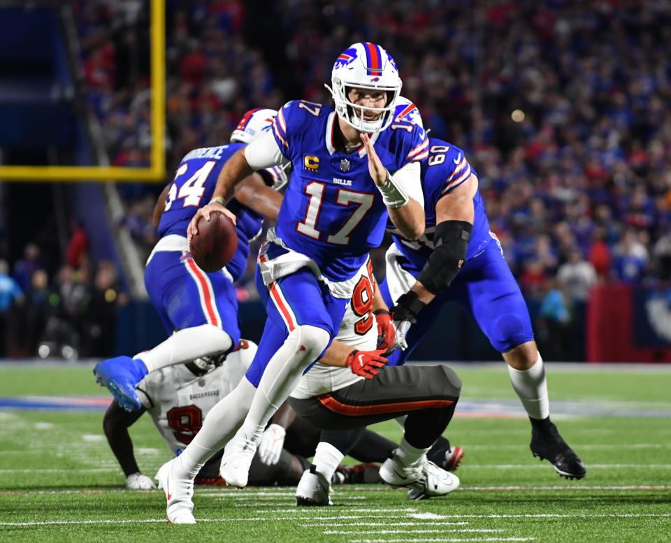 Bills quarterback Josh Allen runs for a first down in the second quarter against the Buccaneers at Highmark Stadium in Orchard Park, N.Y., on Oct. 26, 2023.