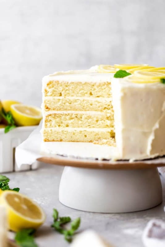 <p>Grandbaby Cakes</p><p>This perfectly moist, tender and soft lemon layer cake is iced in a wonderful lemon cream cheese frosting and bursting with irresistibly zingy and tangy lemon flavor!</p><p><strong>Get the recipe: <a href="https://grandbaby-cakes.com/lemon-layer-cake/" rel="nofollow noopener" target="_blank" data-ylk="slk:Lemon Layer Cake;elm:context_link;itc:0;sec:content-canvas" class="link rapid-noclick-resp">Lemon Layer Cake</a></strong></p>