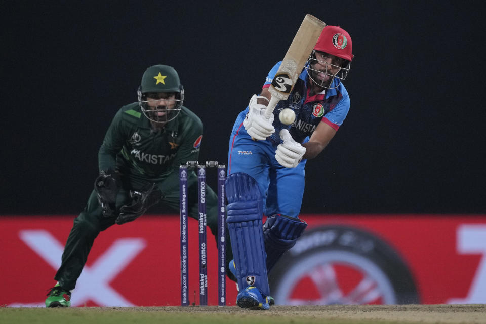Afghanistan's captain Hashimatullah Shahidi plays a shot during the ICC Men's Cricket World Cup match between Pakistan and Afghanistan in Chennai , India, Monday, Oct. 23, 2023. (AP Photo/Anupam Nath)
