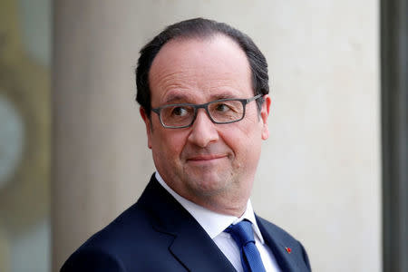 French President Francois Hollande waits for a guest at the Elysee Palace in Paris, France, April 21, 2016. REUTERS/Charles Platiau/File Photo