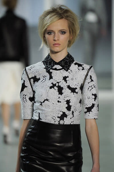 <div class="caption-credit"> Photo by: Getty Images</div><b>3. Contrast collars</b> <br> Peter Pan collars and embellished collars are a huge trend for fall, but you don't need to spend a lot to mimic this style. Search your closet and layer crisp button downs under dresses, sweaters, even sweatshirts for a playful mix-and-match look. You can also buy affordable detachable collars or a costume statement necklace that creates the illusion of a collar.