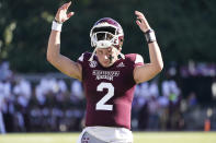 Mississippi State quarterback Will Rogers gestures for a touchdown signal from the officials during the second half of an NCAA college football game against Texas A&M in Starkville, Miss., Saturday, Oct. 1, 2022. (AP Photo/Rogelio V. Solis)