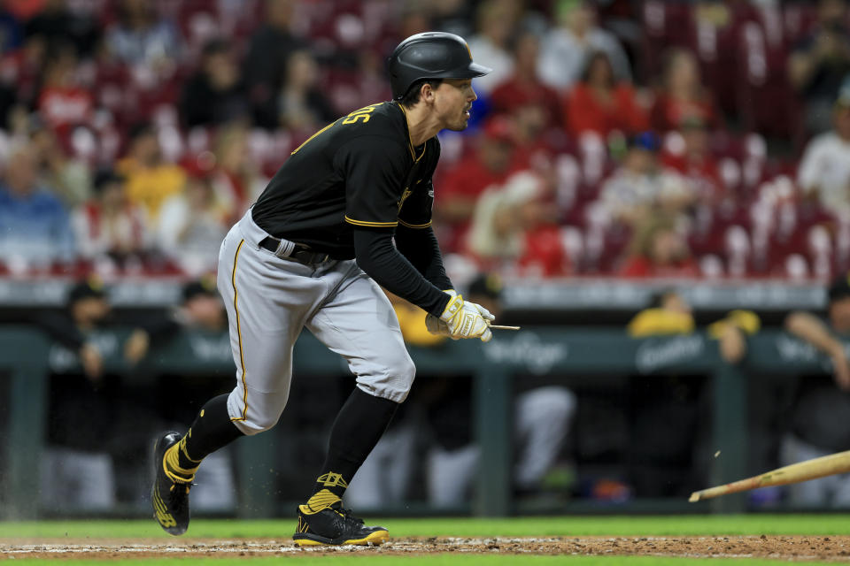 Pittsburgh Pirates' Bryan Reynolds watches his broken bat single during the fifth inning of a baseball game against the Cincinnati Reds in Cincinnati, Monday, Sept. 12, 2022. (AP Photo/Aaron Doster)