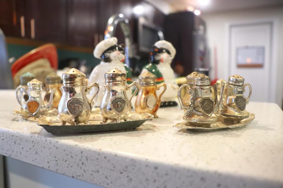 Salt and pepper shakers sitting on a counter