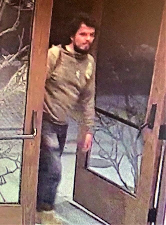 This still image taken from a surveillance camera and provided by the San Luis Obispo County Sheriff's Office seeking the public's assistance in finding a suspect believed to be responsible for a shooting on Wednesday in Paso Robles, Calif.