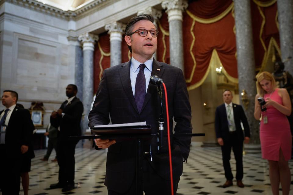 Speaker Mike Johnson talks to reporters after Marjorie Taylor Greene filed a motion to remove him on Wednesday afternoon. The House voted overwhelmingly to keep him in the leadership position (Getty Images)