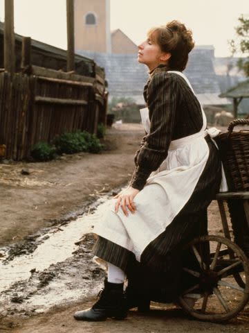 <p>Hulton Archive/Getty</p> Barbra Streisand on the set of Yentl in 1983.