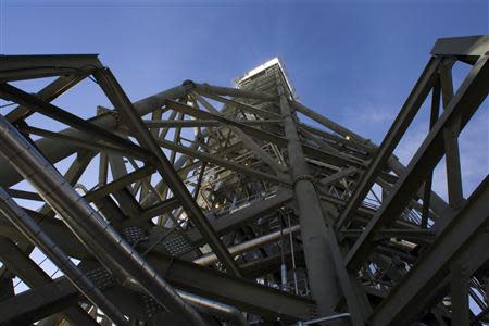 Sunlight is concentrated onto a boiler (top) in Tower One during the grand opening of the Ivanpah Solar Electric Generating System in the Mojave Desert near the California-Nevada border February 13, 2014. REUTERS/Steve Marcus