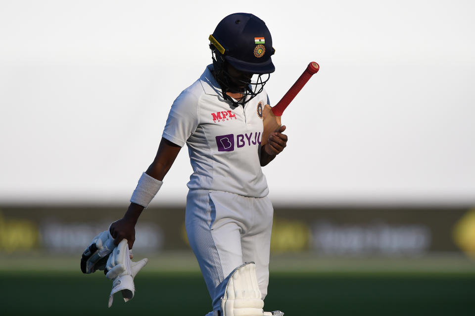 Punam Raut (pictured) walks off the field, despite being given not out against Australia.