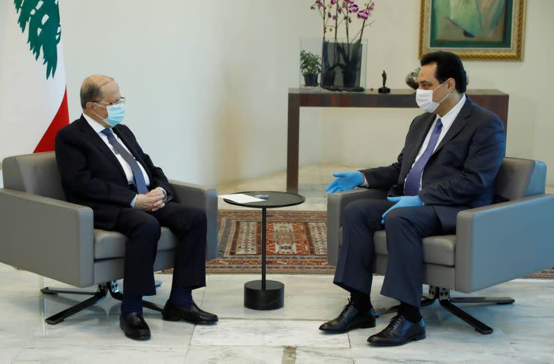 Lebanon's President Michel Aoun meets with Lebanon's Prime Minister Hassan Diab at the presidential palace in Baabda