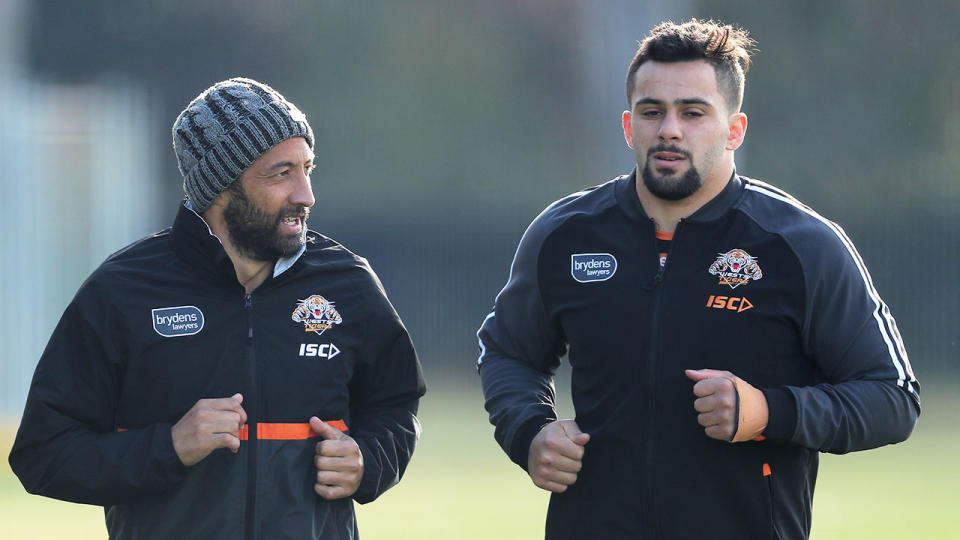 Pictured on the right is Josh Aloiai with Wests Tigers teammate Benji Marshall.