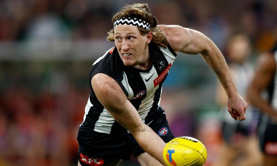 <span>Collingwood player Nathan Murphy has retired from AFL football over fears he may suffer more concussions.</span><span>Photograph: Michael Willson/AFL Photos/Getty Images</span>