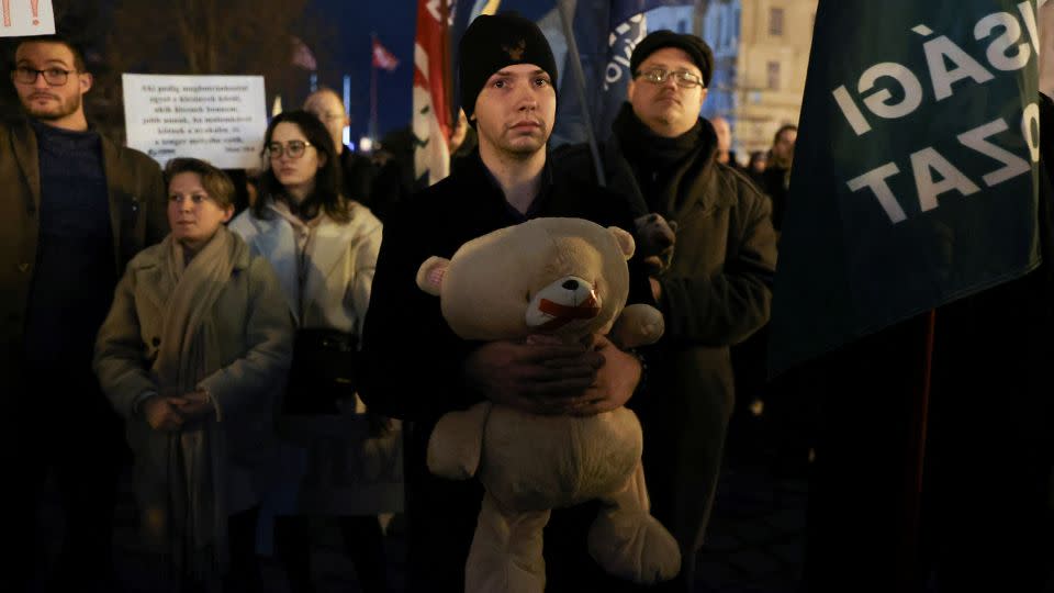 Protesters carried teddy bears, a symbol of sympathy for the abused children, as they marched through Budapest, February 9, 2024. - Bernadett Szabo/Reuters