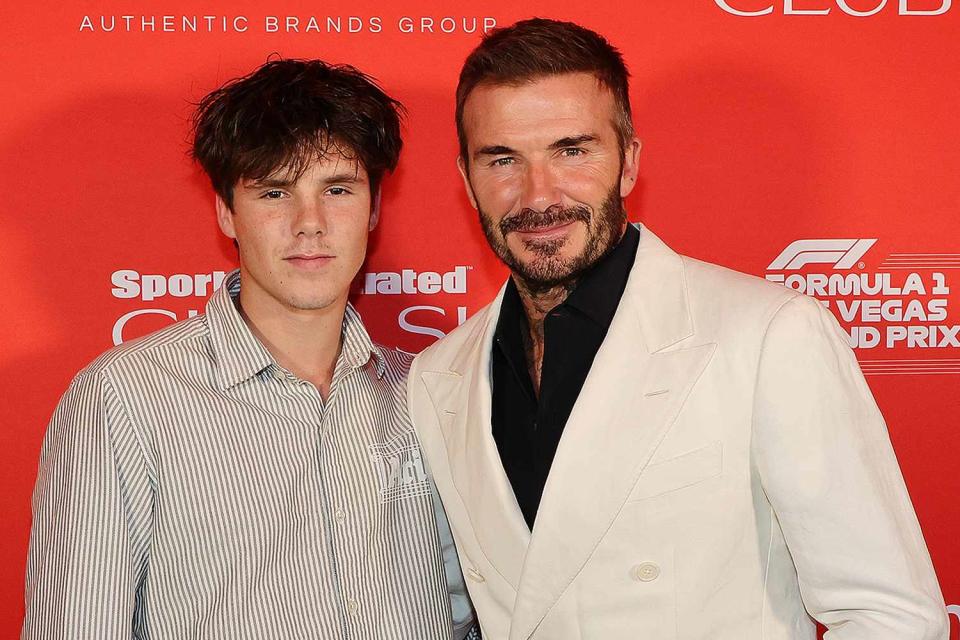 <p>Ethan Miller - Formula 1/Formula 1 via Getty </p> Cruz Beckham and David Beckham